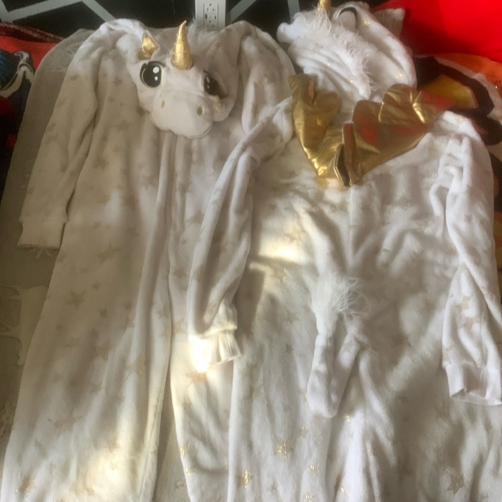 Matching unicorn pajamas/onesies